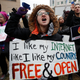Lindsay Chestnut of Baltimore holds a sign that reads “I like My Internet Like I Like my Country: Free & Open” as she protests near the Federal Communications Commission (FCC), in Washington where the FCC was scheduled to meet and vote on net neutrality on Dec. 14, 2017.